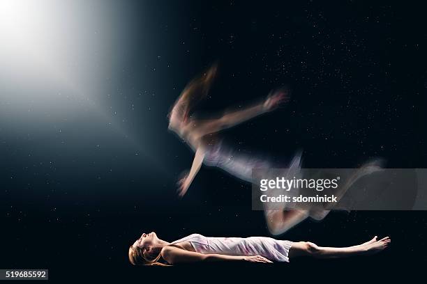 woman having spiritual out of body experience - spirituality stock pictures, royalty-free photos & images