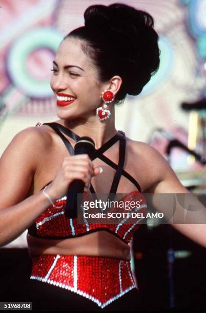 Actress Jennifer Lopez, who plays Selena in the movie "Selena," performs in one of the scenes from the movie. "Selena" is about the tejano singer who...