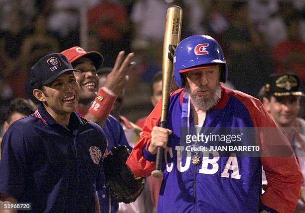 Cuban President Fidel Castro gets ready to bat during a friendly baseball game againt the Venezuelan team 28 October, 2000 in Barquisimeto, 350km...