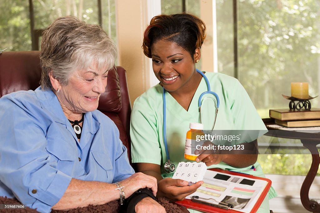 Home healthcare nurse with senior adult patient. Medications.