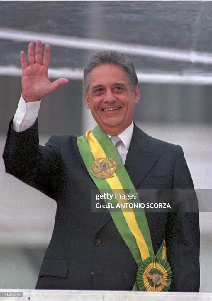 Brazilian President Fernando Henrique Cardoso wave
