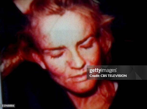 This still frame taken from a television broadcast shows 31 January 1995 a photograph of Nicole Brown Simpson entered into evidence at the O.J....