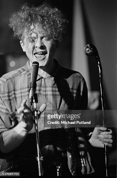English singer Mick Hucknall performing with Simply Red at a video shoot in London, September 1985.