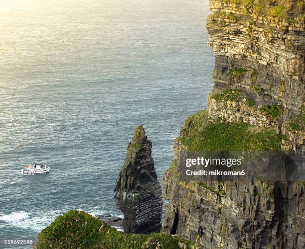 cliffs of moher sunset time - costal surface human lung stock pictures, royalty-free photos & images