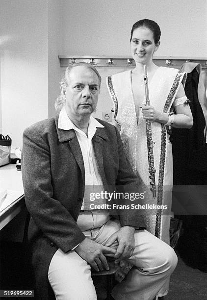 German classical composer Karl Heinz Stockhausen, poses with flute-player Katinka Pasveer at De Speeldoos on December 2nd 1991 in Zaandam,...