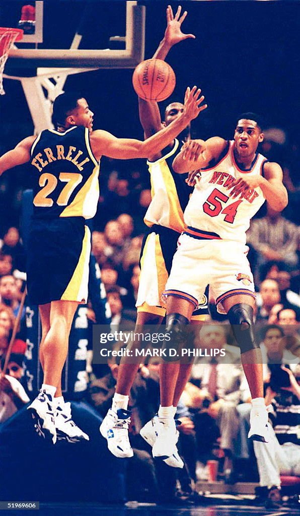 New York Knicks Charles Smith gets a pass off after grabbing an... News Photo Getty Images