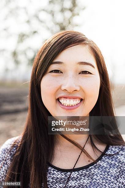 the portrait of asian girls with smile - linghe zhao stock pictures, royalty-free photos & images