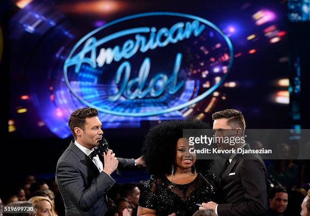 Host Ryan Seacrest and finalists La'Porsha Renae and Trent Harmon speak onstage during FOX's "American Idol" Finale For The Farewell Season at Dolby...