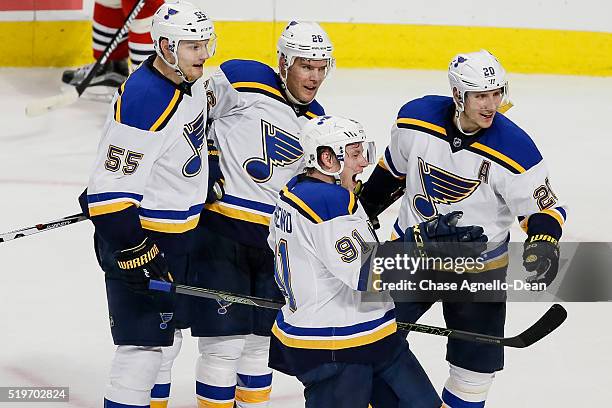 Vladimir Tarasenko of the St. Louis Blues celebrates with teammates Colton Parayko, Paul Stastny and Alexander Steen after scoring and tying the game...