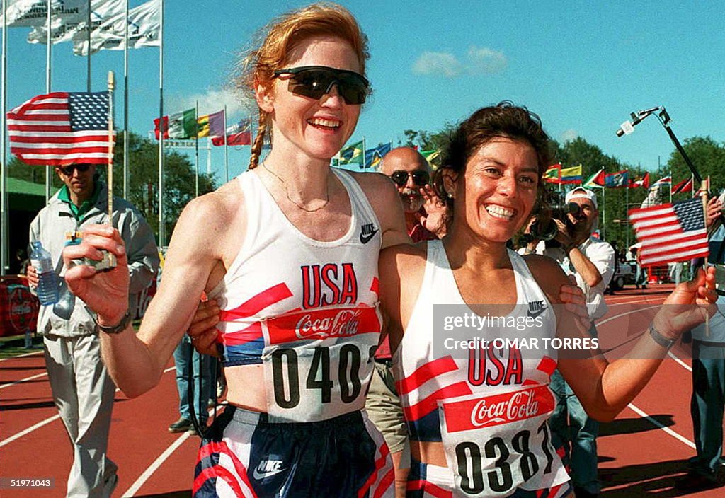 US long distance runner Maria Trujillo waves a US flag alongside