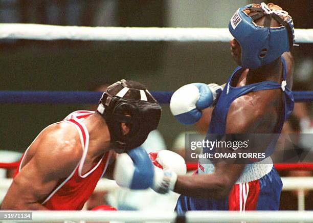 Boxer Antonio Tarver launches an uppercut towards Gabriel Hernandez, of the Dominican Republic, 23 March during their light heavyweight bout at the...