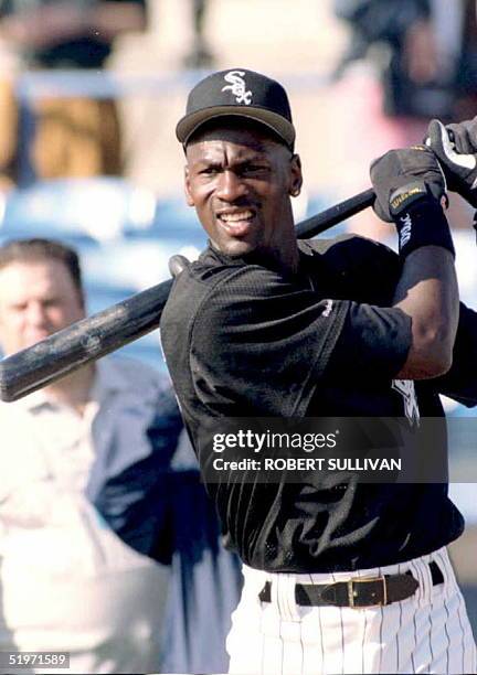 Michael Jordan, who is rumored to be considering a return to professional basketball, warms up before his first spring workout with the Chicago White...