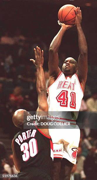 Miami Heat forward Glen Rice shoots over Terry Porter of the Porland Trailblazers 09 March of their NBA game in Miami, Fl. Portland comes into their...