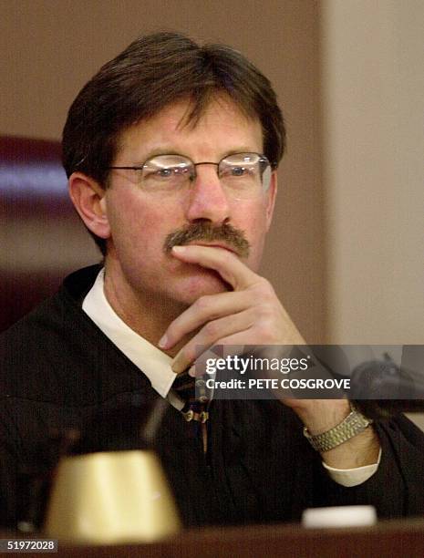 Florida Circuit Court Judge Terry Lewis listens to hearings in Leon County Courthouse, 16 November 2000, in Tallahassee, Florida. A member of the...