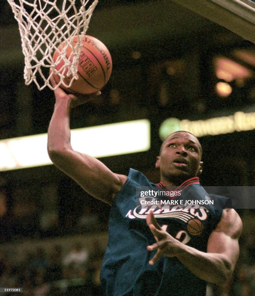 T Ratliff Theo Ratliff, of the Philadelphia 76ers, goes up to the net against ...