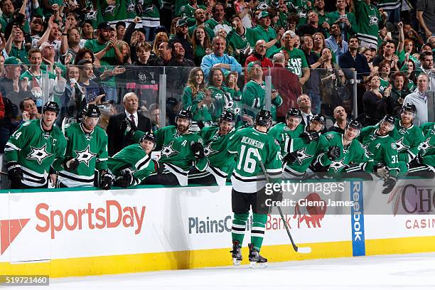 Jason Dickinson of the Dallas Stars is congratulated by his teammates on his first NHL goal against the Colorado Avalanche at the American Airlines...