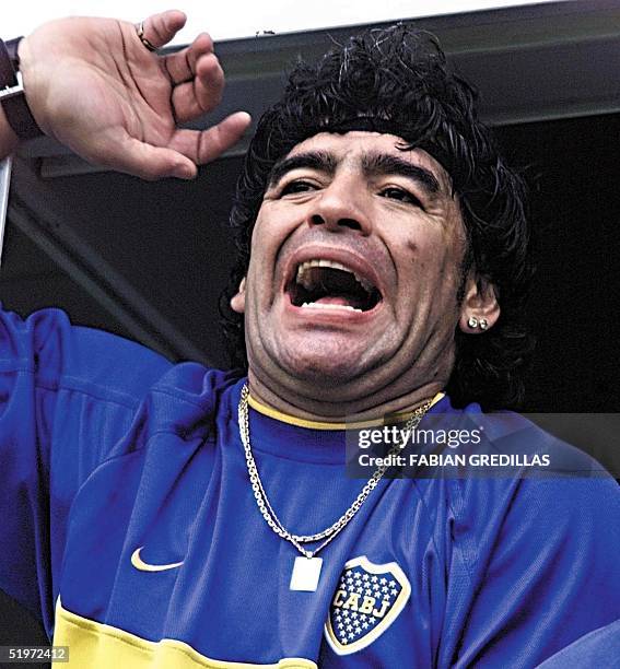 Ex-soccer player Diego Armando Maradona celebrates a Boca Juniors win 03 December in Buenos Aires. El ex futbolista Diego Armando Maradona festeja...