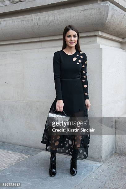 Blogger Camila Coelho wears all Akris on day 6 during Paris Fashion Week Autumn/Winter 2016/17 on March 6, 2016 in Paris, France. Camila Coelho