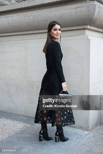 Blogger Camila Coelho wears all Akris on day 6 during Paris Fashion Week Autumn/Winter 2016/17 on March 6, 2016 in Paris, France. Camila Coelho