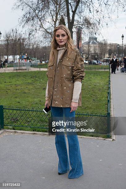 Actress and Model Olivia Palermo wears Valentino jacket, Riess jeans and Brunello Cucinelli sweater on day 6 during Paris Fashion Week Autumn/Winter...