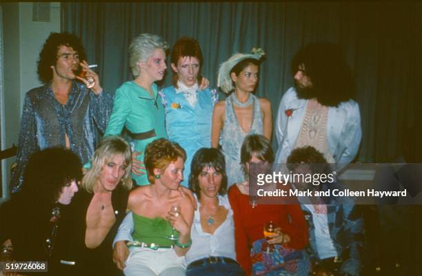 Party following David Bowie's Ziggy Stardust retirment concert, Cafe Royal, London, 4th July 1973. L-R unknown, Angie Bowie, David Bowie, Bianca...