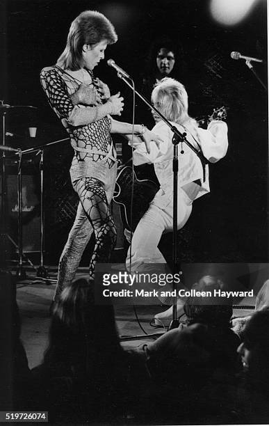 David Bowie and guitarist Mick Ronson on stage at the Marquee Club, London, during filming of 'The 1980 Floor Show'. The performance was filmed,...