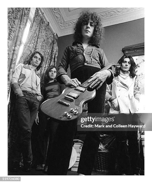 Group portrait of glam rock group T Rex, London, 1971. L-R Steve Currie, Bill Legend, Marc Bolan, Mickey Finn.