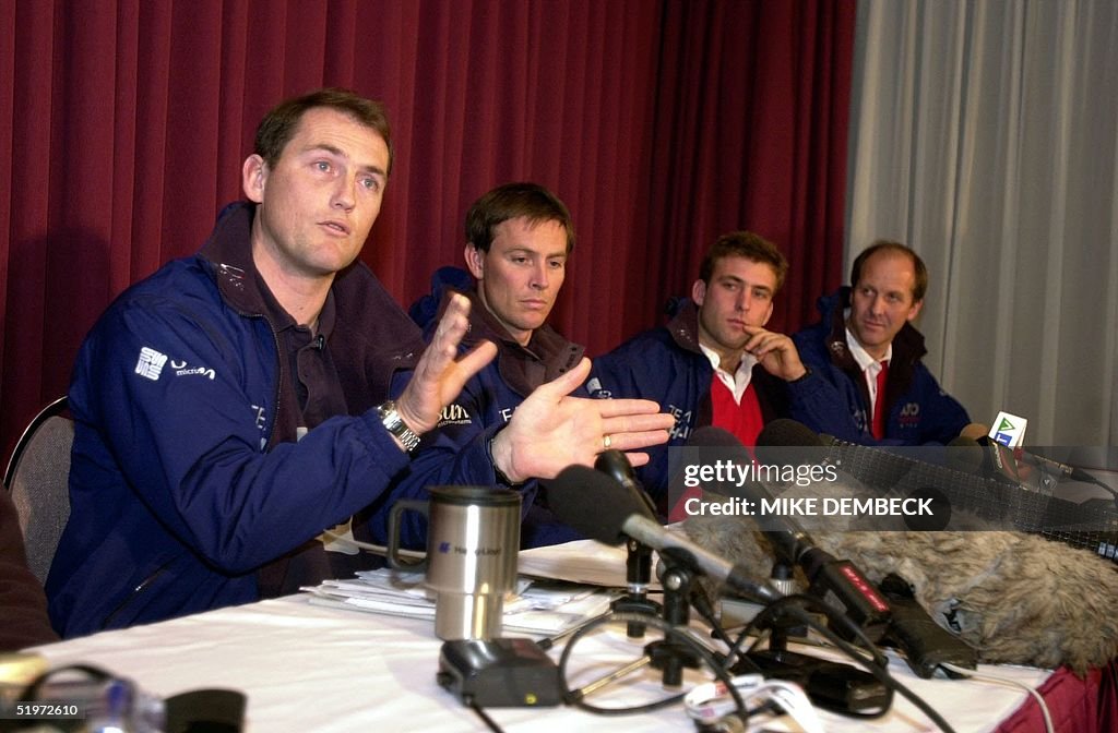 Captain of Team Philips Peter Goss(L) addresses a