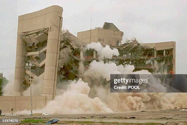 The Alfred P. Murrah building collapses during its five-second-implosion in Oklahoma City, OK, 23 May, following its partial destruction by a...