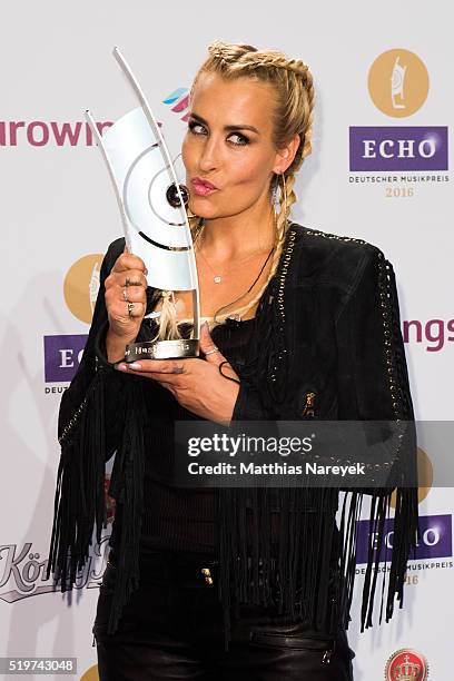 Sarah Connor poses with her award at the winners board during the Echo Award 2016 on April 7, 2016 in Berlin, Germany.