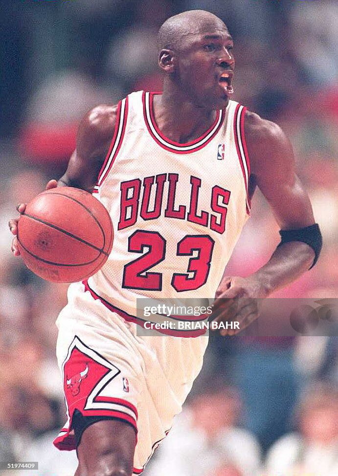 Chicago Bulls guard Michael Jordan wears his old n