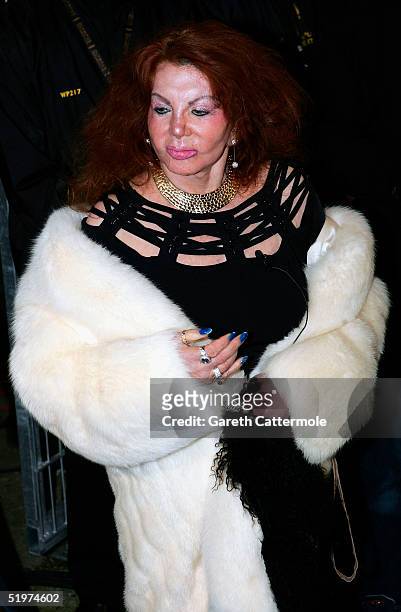 Celebrity Big Brother III housemate Jackie Stallone poses for photographs outside the Big Brother house having been the first celebrity to be evicted...