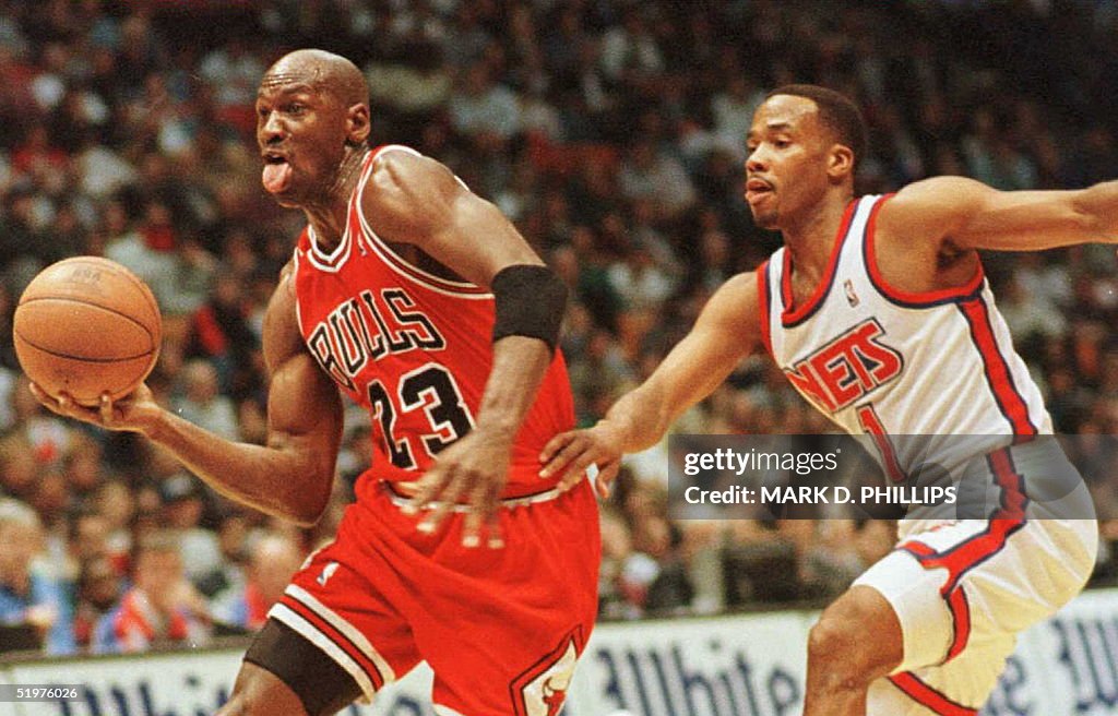 Chicago Bulls' Michael Jordan drives for a layup p