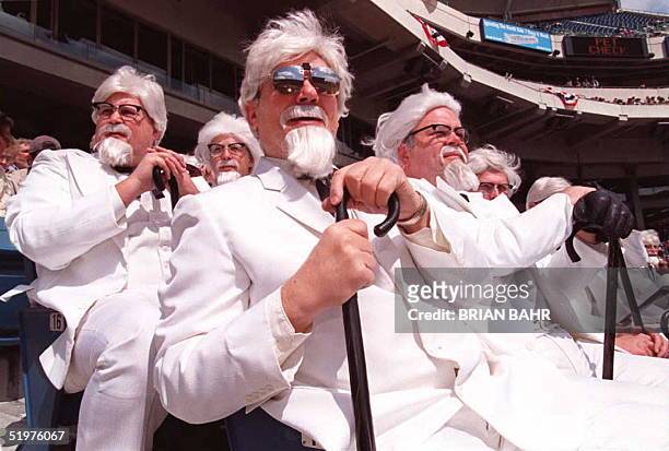 Sheldon Baren and others of a group of 30 men dressed like the late Colonel Harlan Sanders, the founder of the Kentucky Fried Chicken fast food...