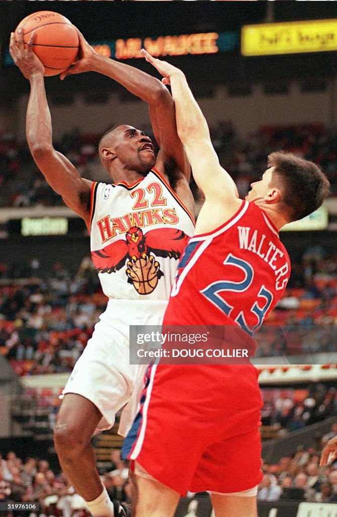 Atlanta Hawks Reggie Jordan (22) shoots over Phila