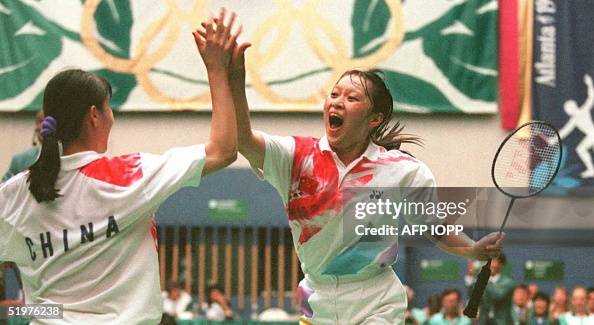 Gu Jun China's Ge Fei and Gu Jun congratulate each other after defeating ...