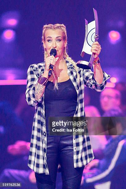 Singer Sarah Connor accepts her award during the Echo Award 2016 show on April 07, 2016 in Berlin, Germany.