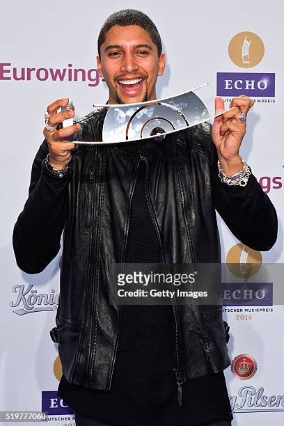 Andreas Bourani poses with his award at the winners board during the Echo Award 2016 on April 7, 2016 in Berlin, Germany.