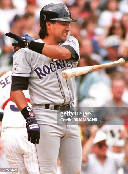 Colorado Rockies batter Vinny Castilla tosses his bat in the air after striking out against Chicago Cubs pitcher Jaime Navarro in the sixth inning 01...