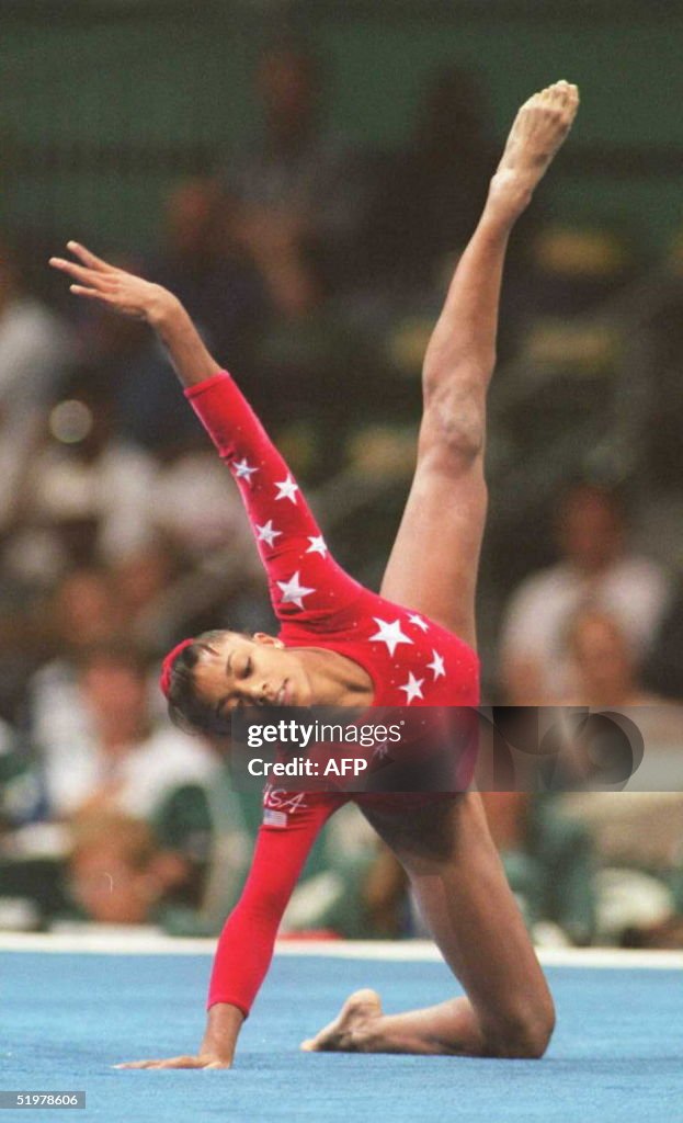 Dominique Dawes of the US performs her routine in