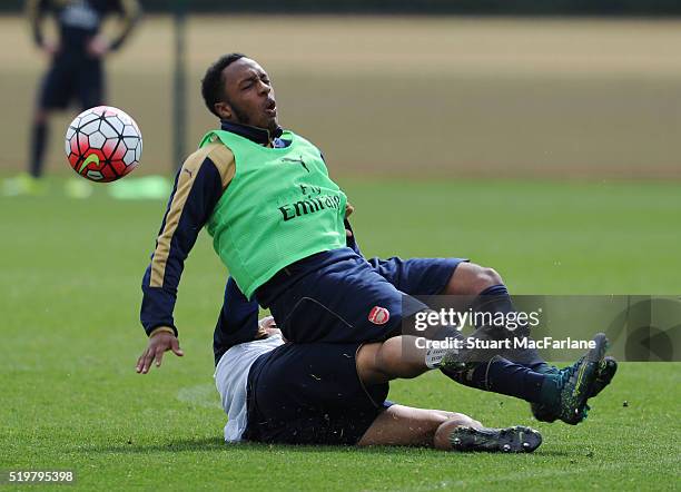 Kaylen Hinds and Francis Coquelin of Arsenal during a training session at London Colney on April 8, 2016 in St Albans, England.