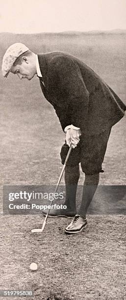 American amateur golfer Jerome Travers putting at Hoylake, circa April 1914.