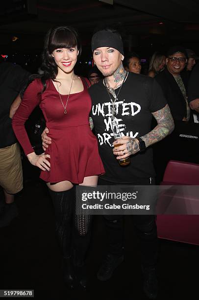 Model Claire Sinclair and guitarist Dj Ashba of Sixx:A.M. Attend an after party for the grand opening of guitarist Dj Ashba's Ashba Clothing Store at...