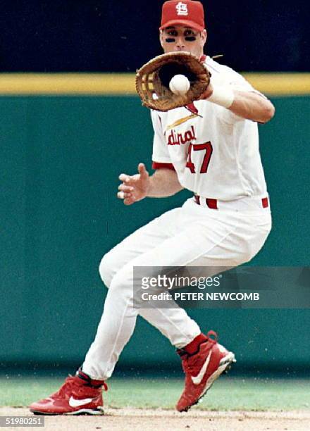 St. Louis Cardinal John Mabry fields a ball hit by San Diego Padre Tony Gwynn in the third inning 08 September in St. Louis. The Padres beat the...