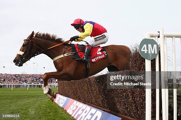 Richard Johnson riding Native River clears the last on his way to victory in the Betfred Mildmay Novices' steeplechase at Aintree Racecourse on April...