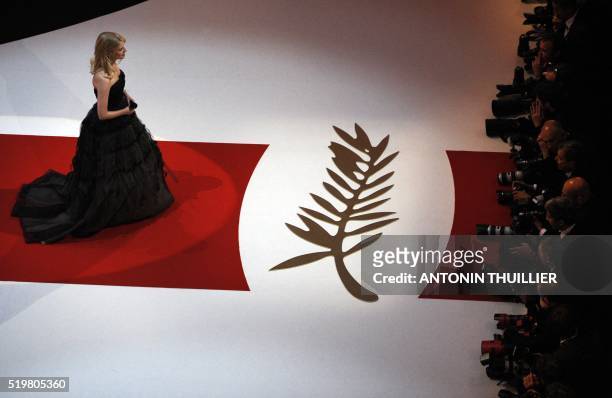 French actress and host Melanie Laurent arrives on stage for the opening ceremony of the 64th Cannes Film Festival on May 11, 2011 in Cannes. AFP...