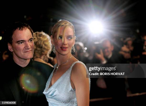 Director and jury president Quentin Tarantino and US actress Uma Thurman arrive for the official projection of the film "Kill Bill 2", 16 May 2004...