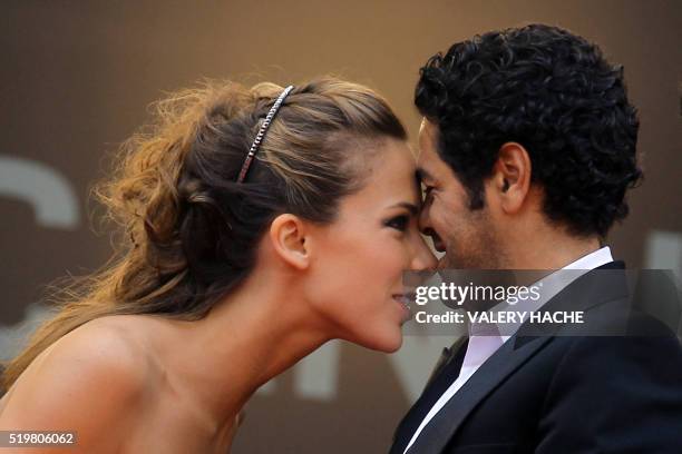 French journalist Melissa Theuriau and French actor Jamel Debbouze arrive for the screening of "Hors La Loi" presented in competition at the 63rd...