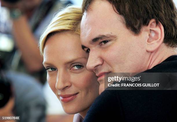 Director and jury president Quentin Tarantino and US actress Uma Thurman pose during a photo call for the film "Kill Bill 2", 16 May 2004 during the...