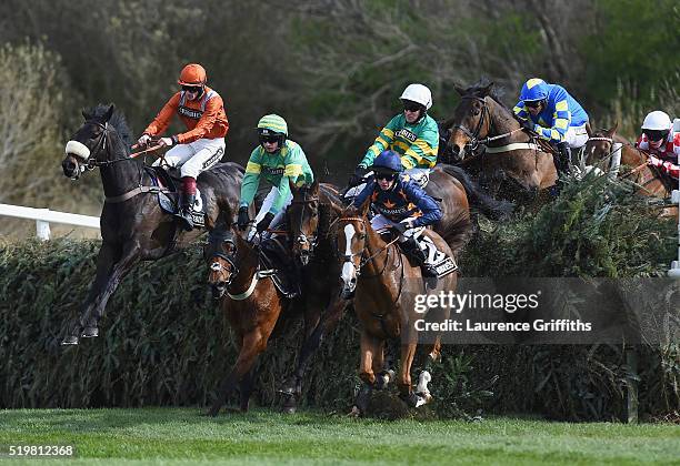 Eastlake ridden by Barry Geraghty jumps Canal Turn behind leader Fairy Rath ridden by Tom Cannon during The Crabbies Topham Steeple Chase at Aintree...